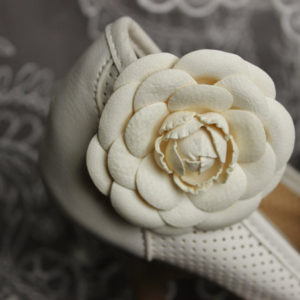 white flower shoe clips