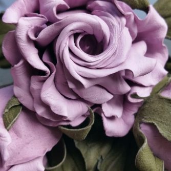leather lilac rose spray corsage