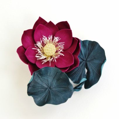 Leather lotus brooch
