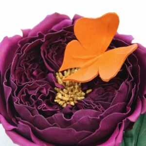 Leather English rose corsage with a butterfly