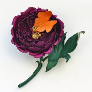 Leather English rose corsage with a butterfly