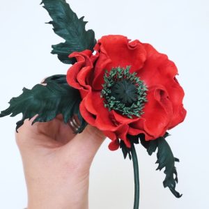 red leather poppy corsage side