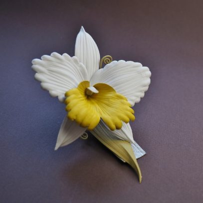 leather orchid brooch