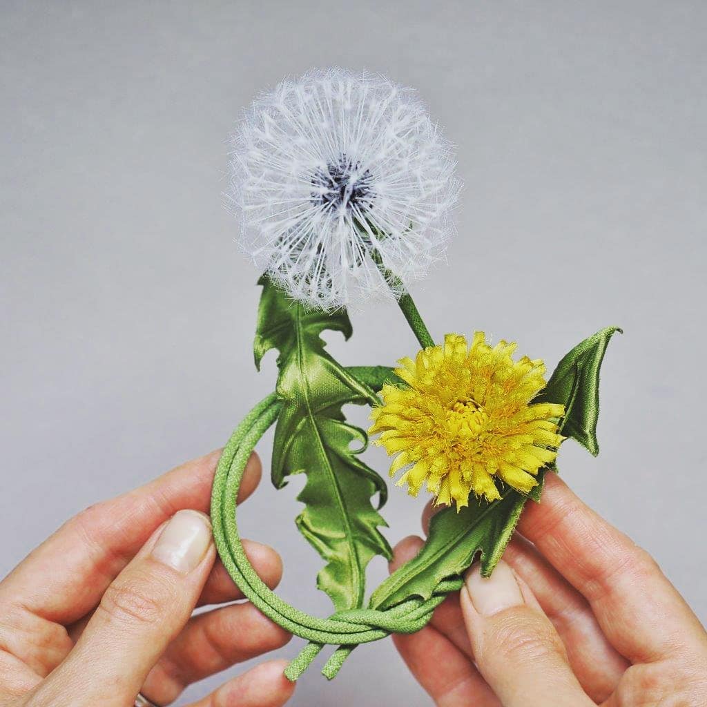 silk dandelion clock with a flower brooch