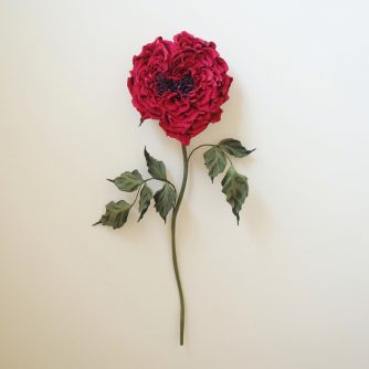 heart shaped red leather rose