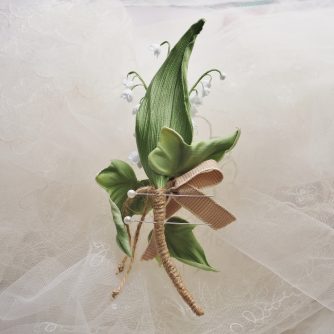 lily of the valley buttonhole back