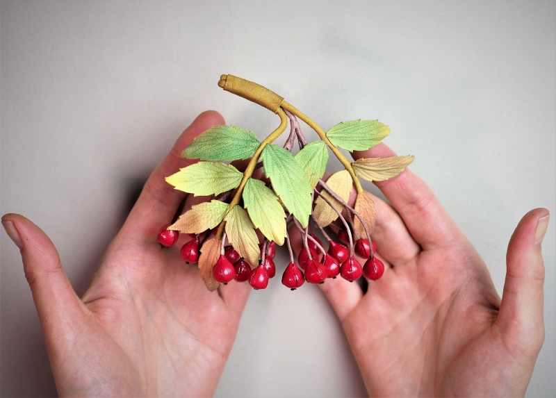 leather rowanberry brooch