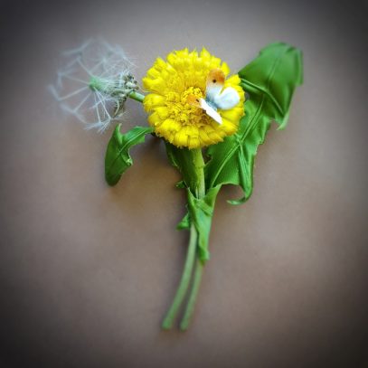 silk dandelion flower and clock corsage