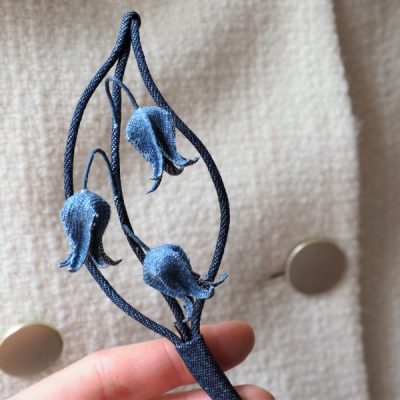 denim bluebells flower brooch hand