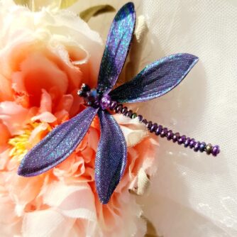 purple dragonfly on rose 700