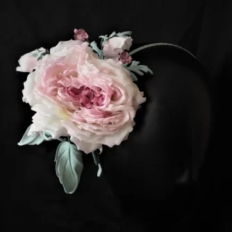 large asymmetrical rose headpiece