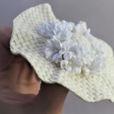 Miniature linen hat brooch