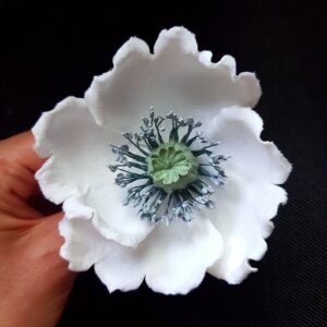 white velvet poppy corsage closeup