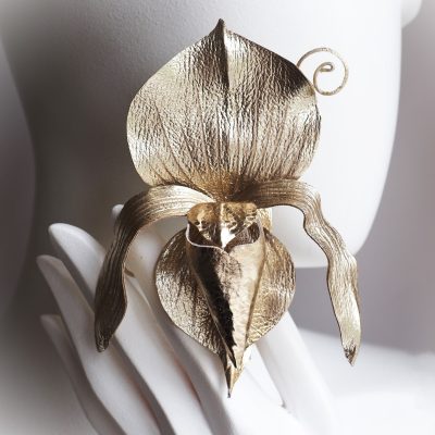golden leather orchid brooch