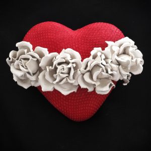 red leather heart white roses