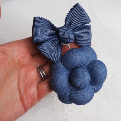 Denim camellia medal brooch